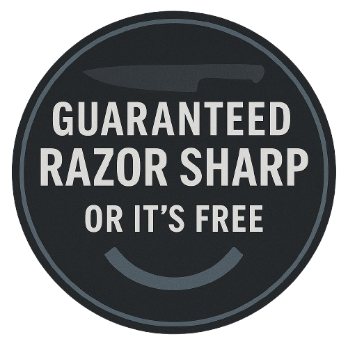 A round black badge features a gray chef’s knife icon at the top and bold white text reading “GUARANTEED RAZOR SHARP OR IT’S FREE.” A subtle curved line below the text resembles a smile or a blade edge. The background is light gray.